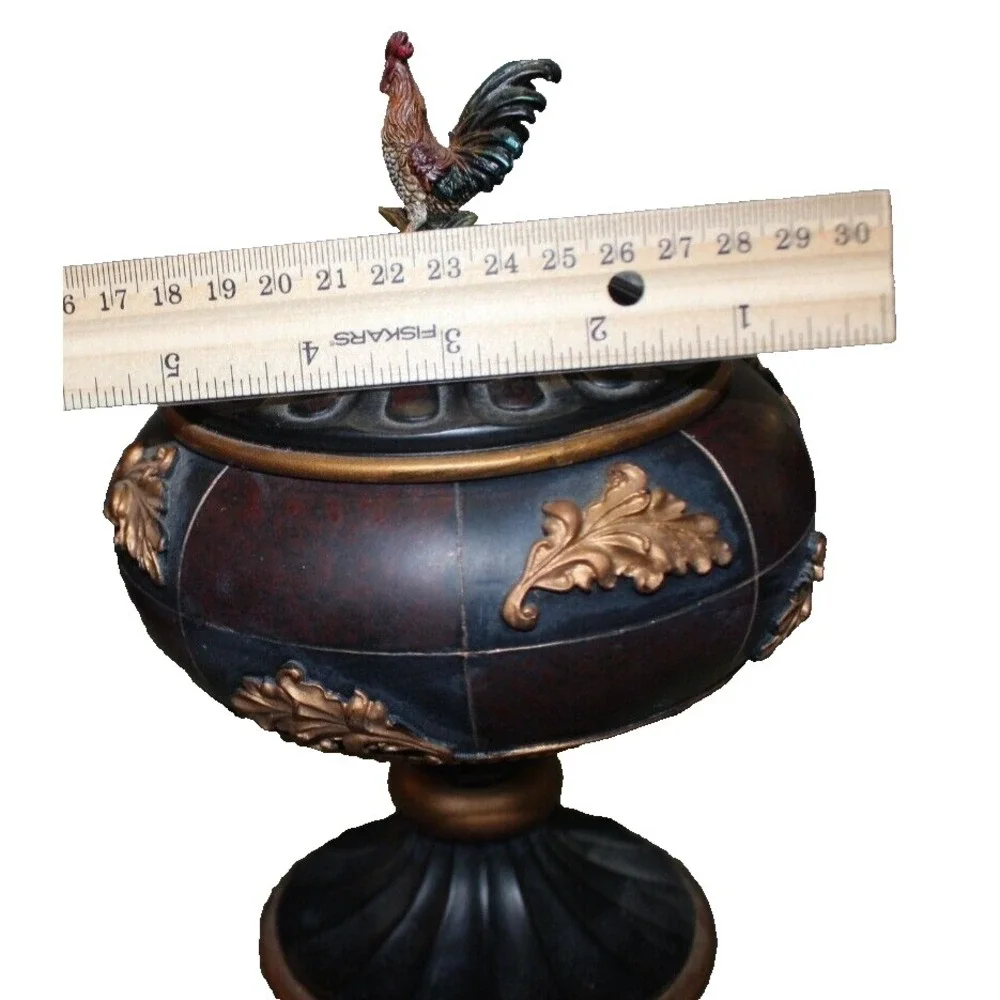 Notions container in form of large lidded pedestal cup with rooster on top